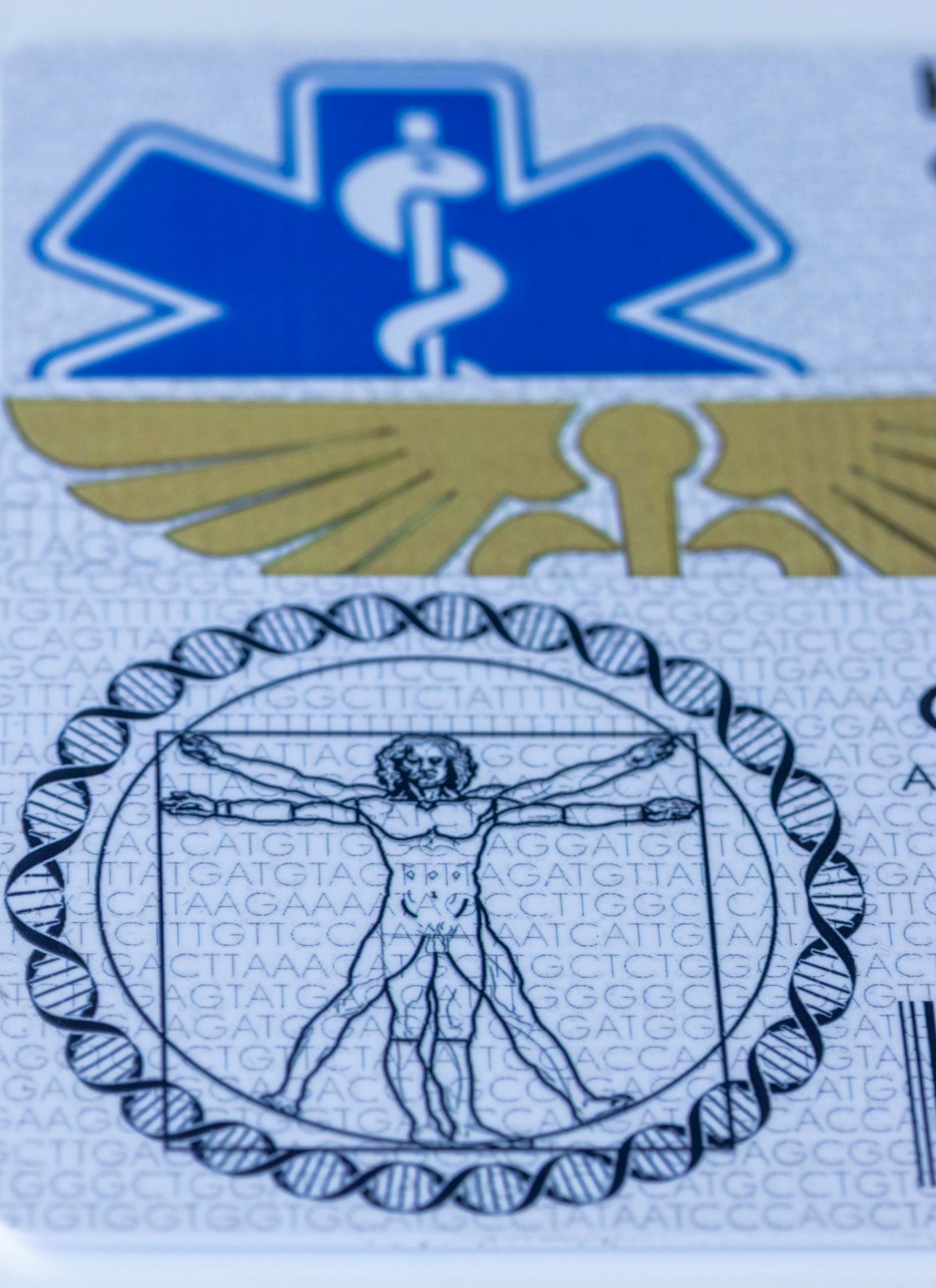 A medical id card with a picture of a man on it
